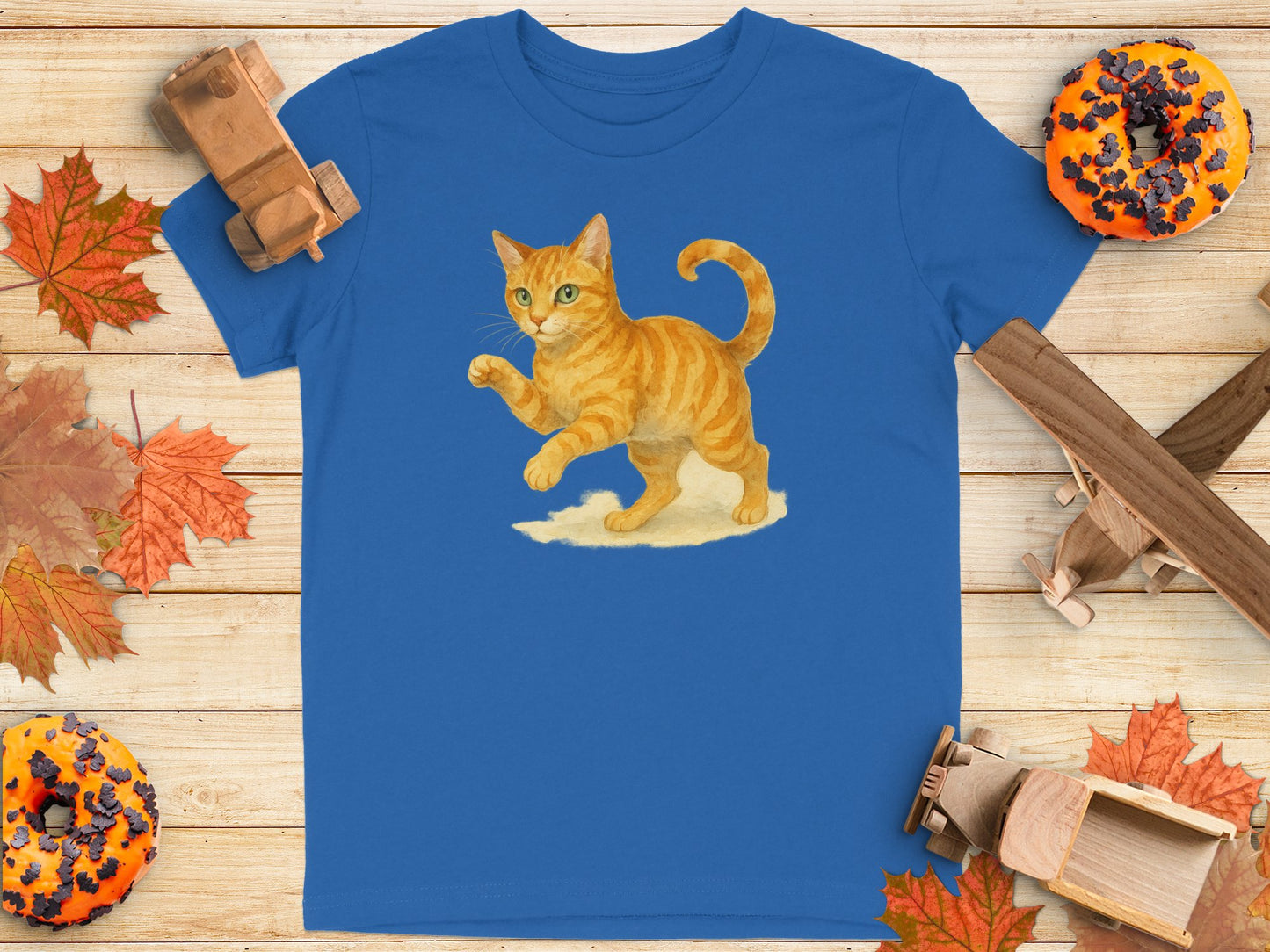 Playful Orange Cat on Blue T-shirt product type