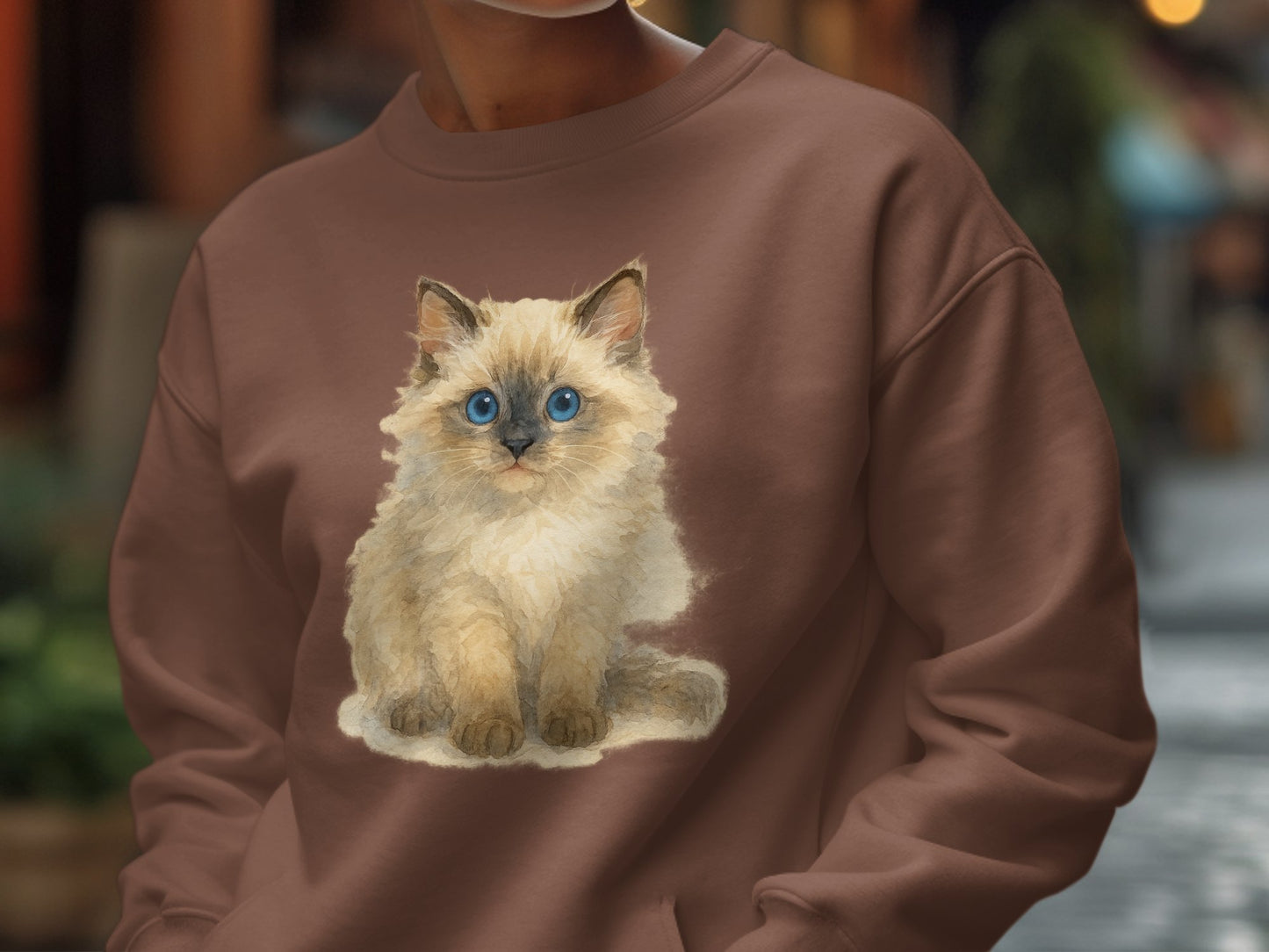 Adorable Fluffy Blue-Eyed Kitten Print on Brown product type
