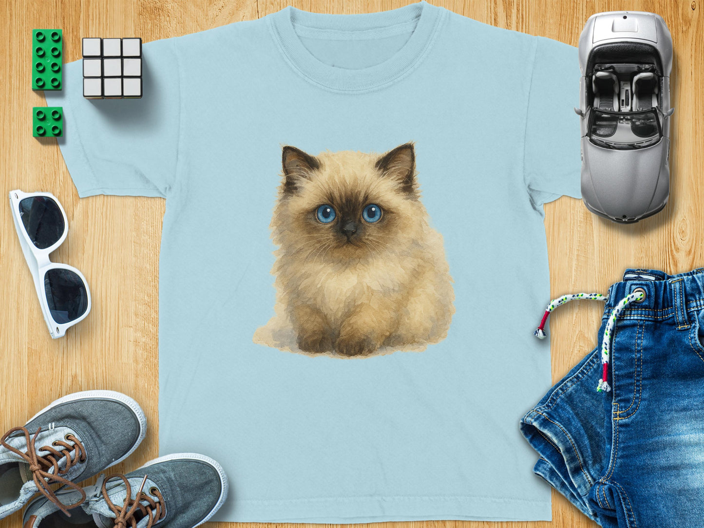 Cute Blue-Eyed Kitten Art on Light Blue Shirt product
