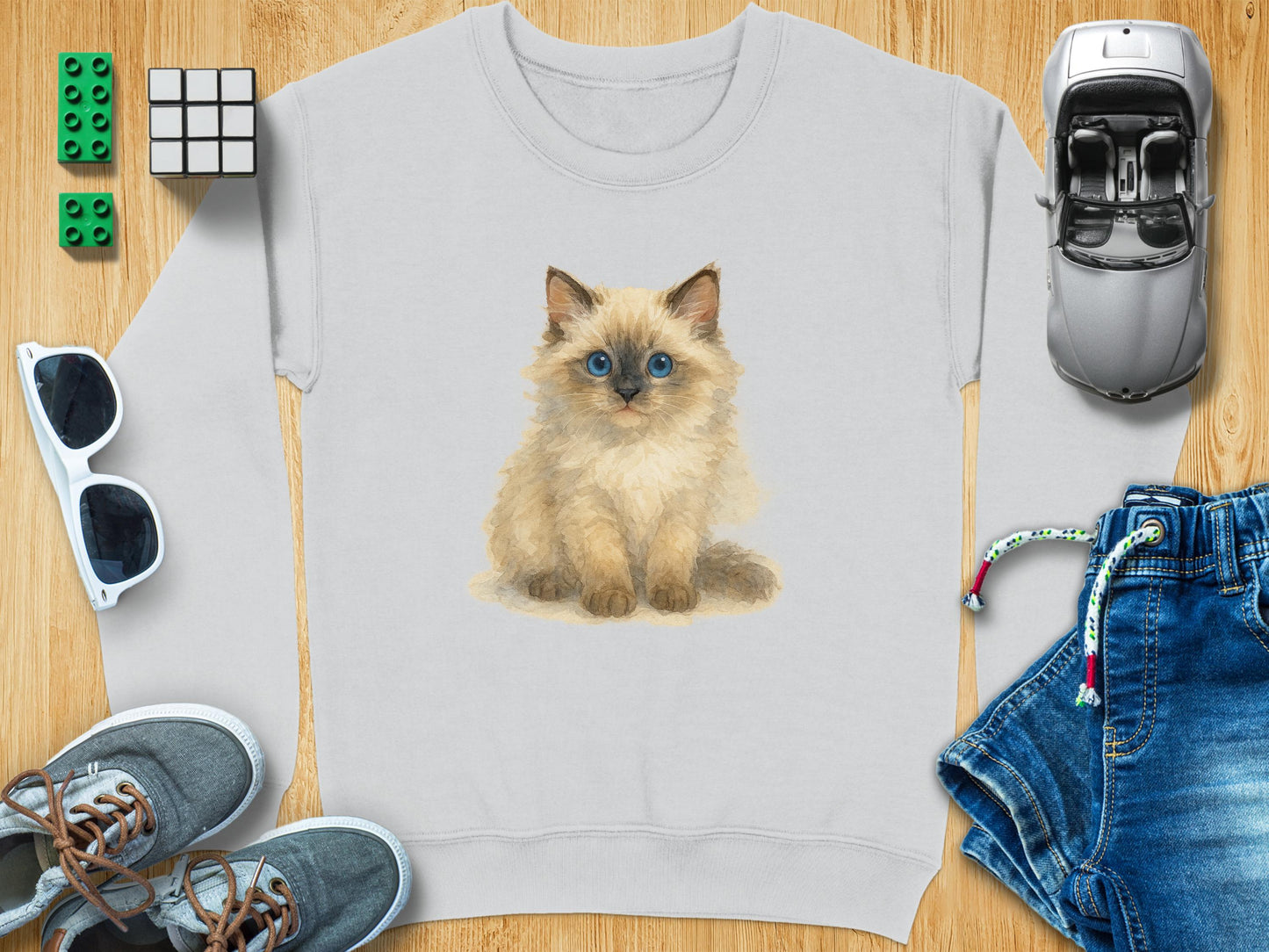Adorable Fluffy Kitten Design on Clothing product type