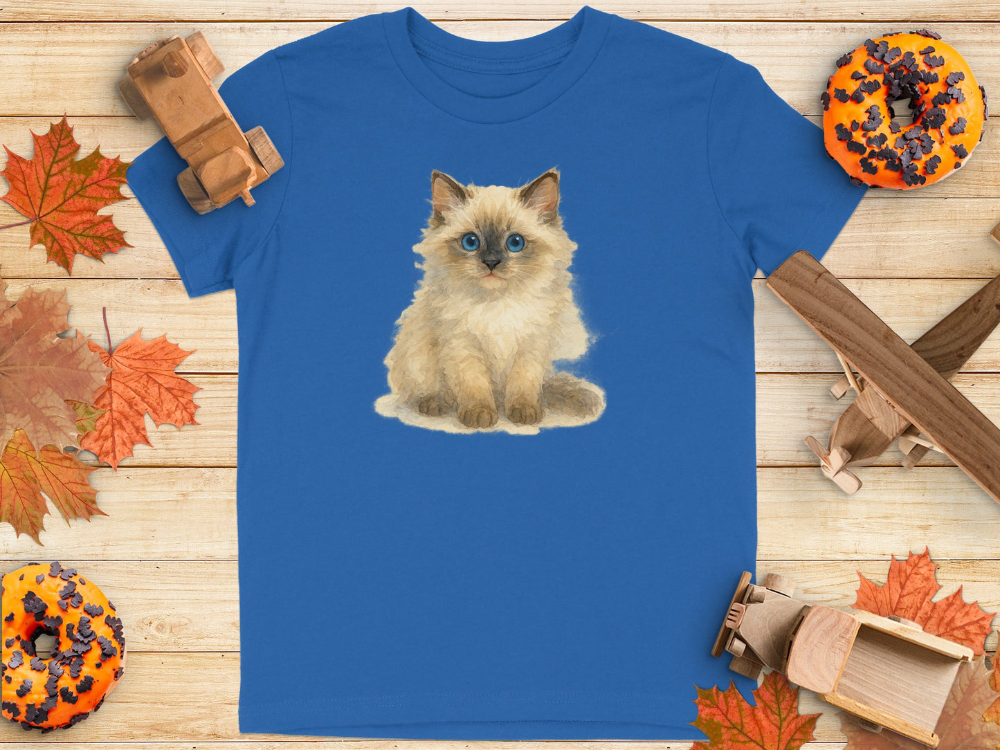 Adorable Blue Eyed Kitten Print on Blue T-shirt product type