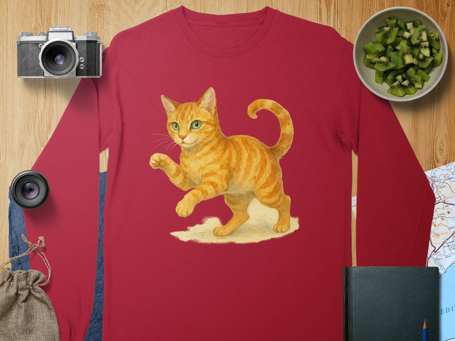 Playful Orange Cat Illustration on Red Long Sleeve product
