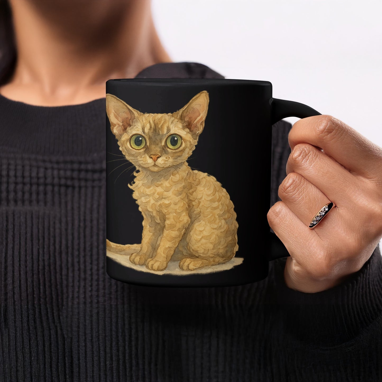 Adorable Big-Eyed Kitten Design on Black Mug product