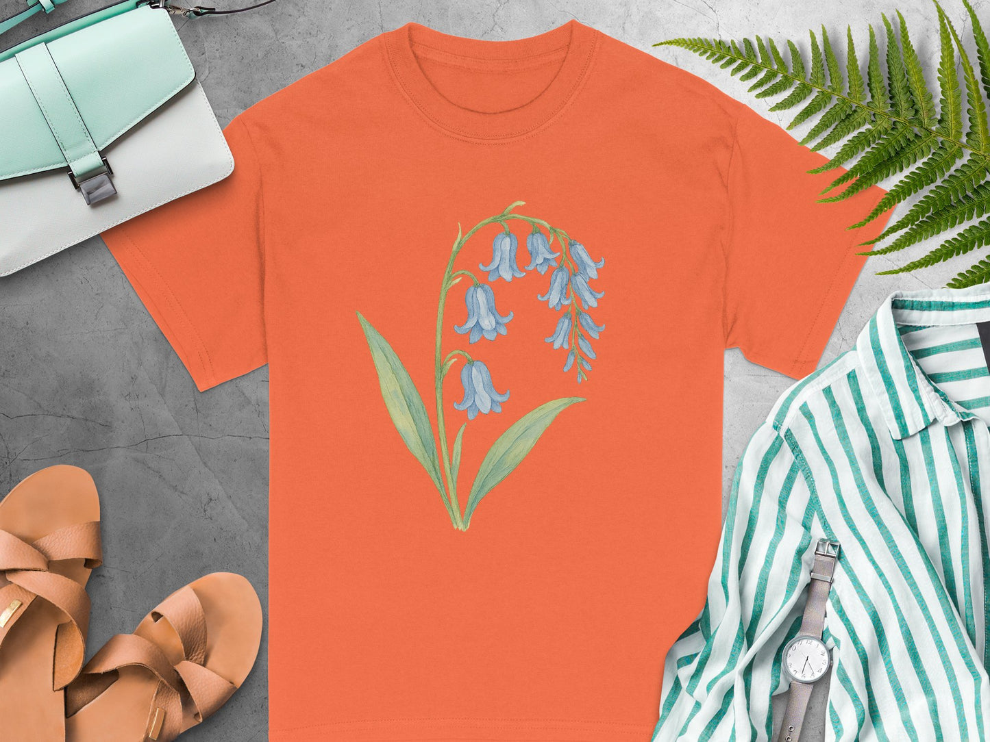 Vibrant orange shirt with blue floral design shirt