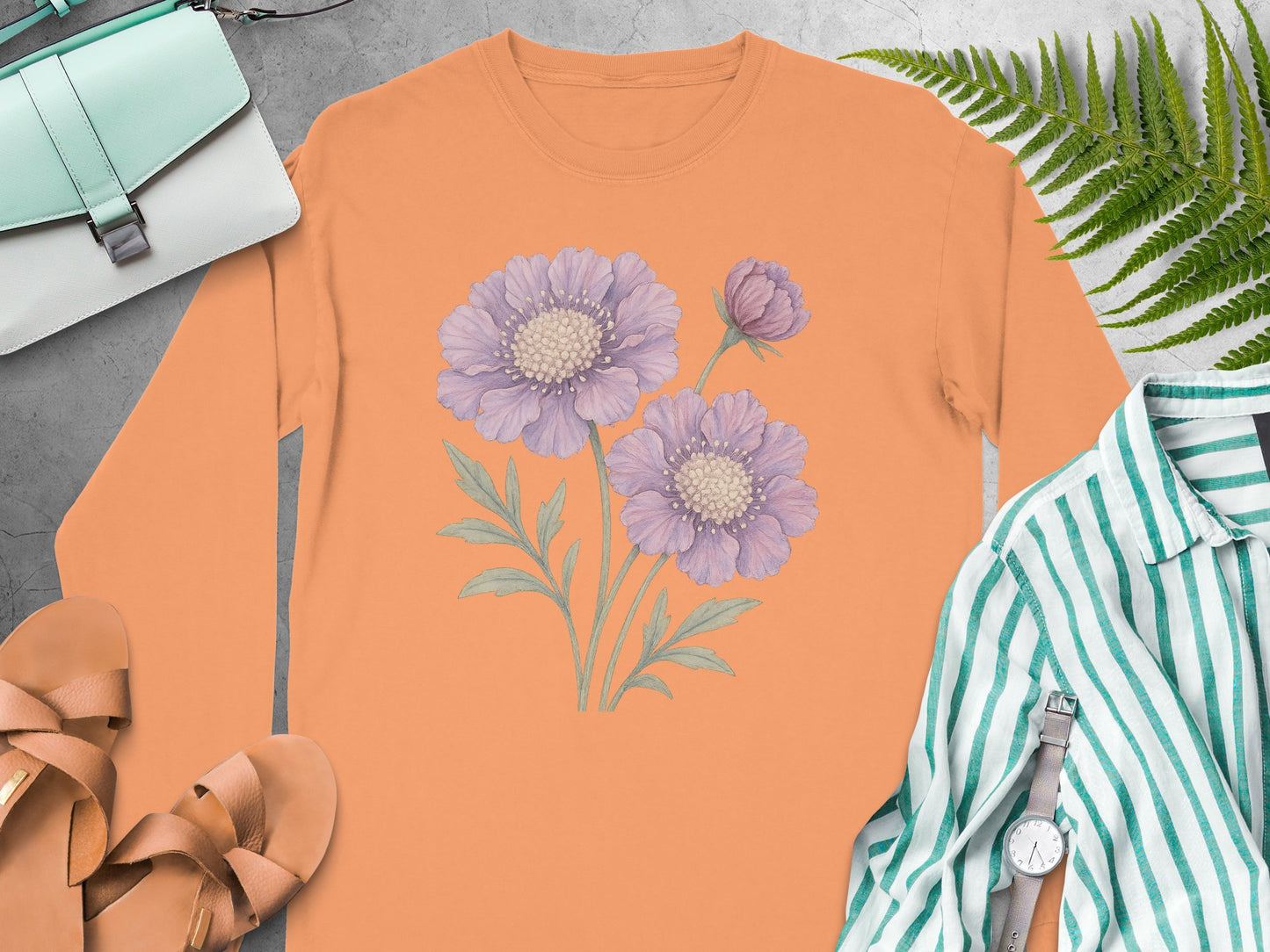 Elegant Floral Design on Orange Long Sleeve Shirt product