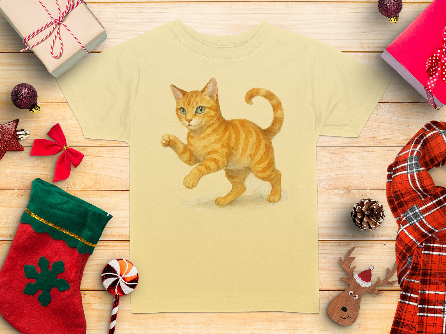 Cute Playful Orange Cat in Holiday Scene T-shirt Product