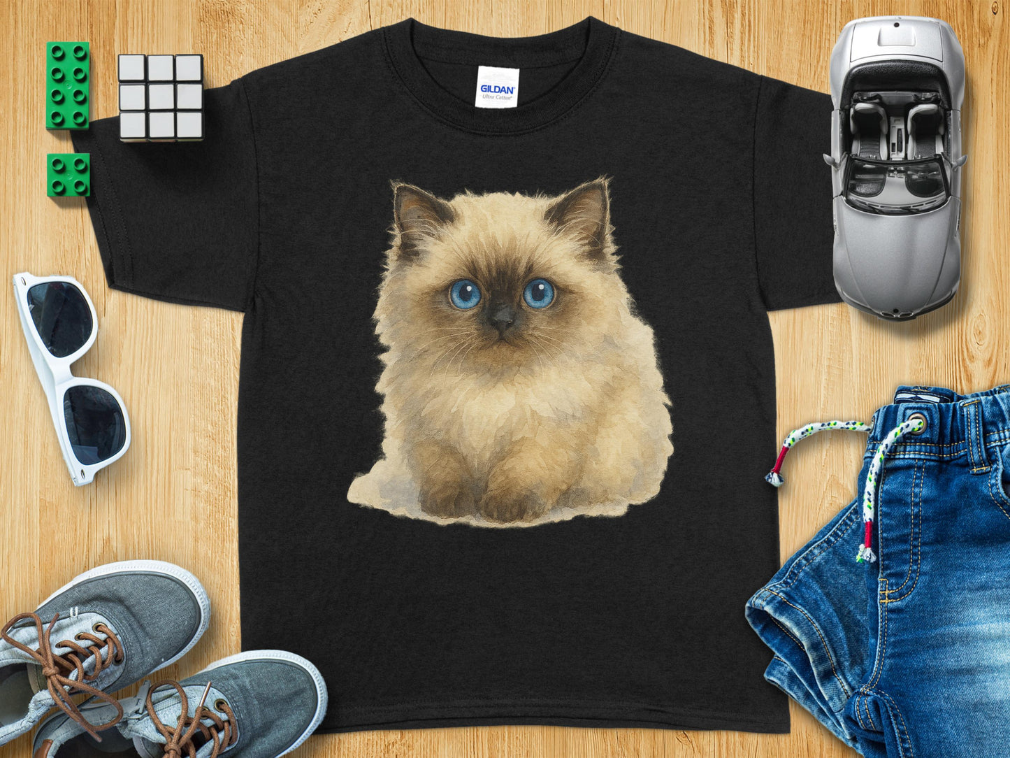 Fluffy Blue-Eyed Cat Graphic on Black T-Shirt product