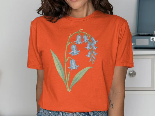 Stylish Orange Graphic Tee with Floral Design product type