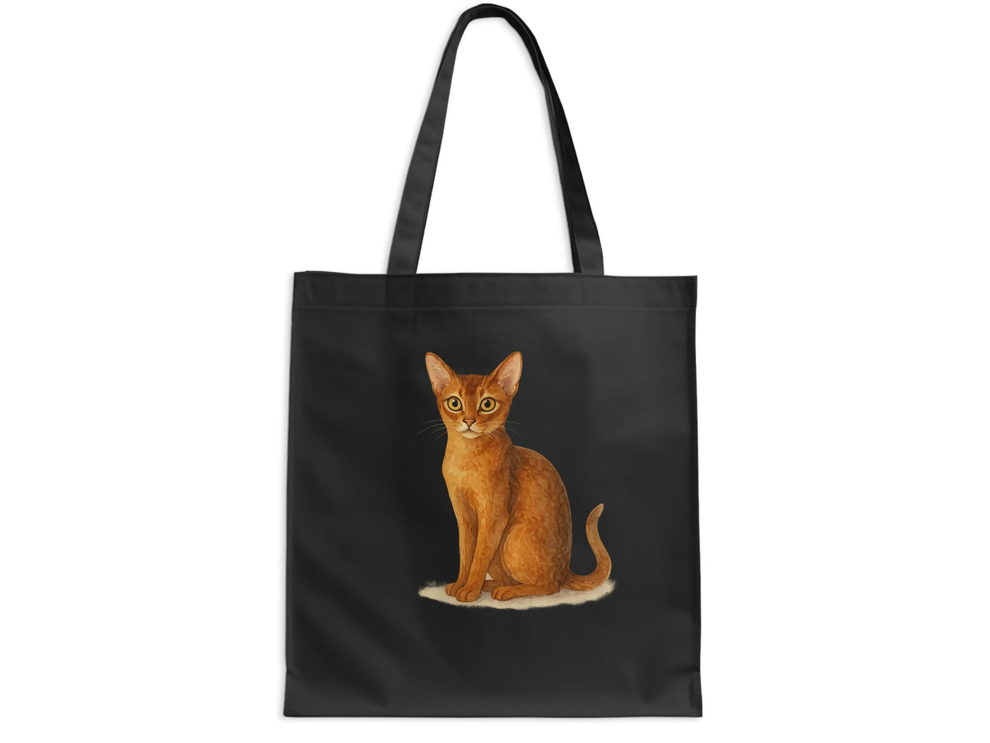 Small cat sitting on black color fabric tote product type