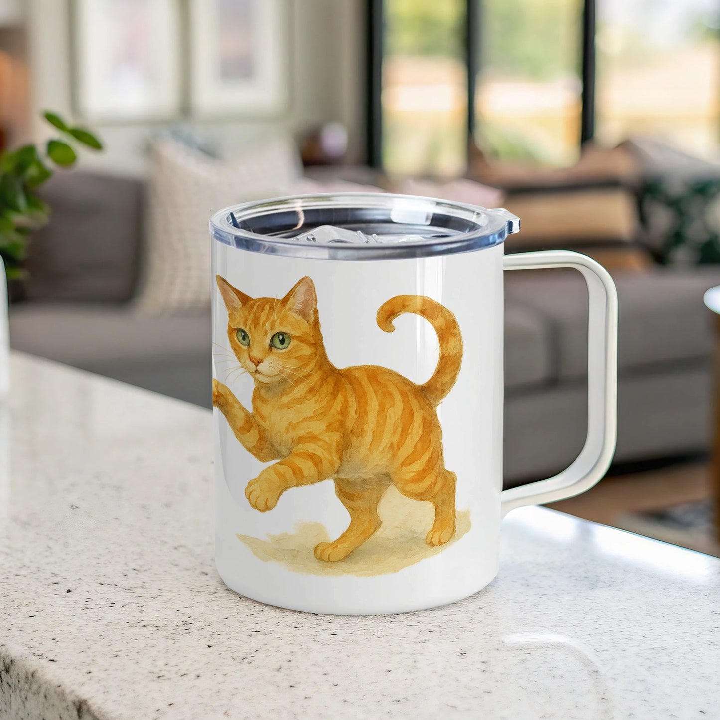 Insulated mug with playful orange cat artwork product type