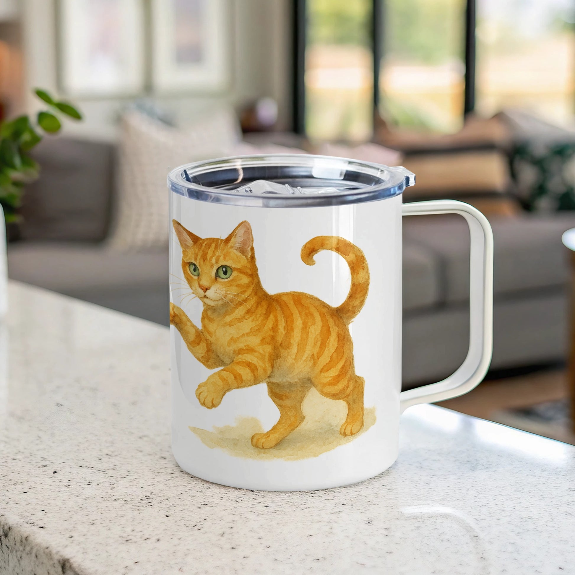 Insulated mug with playful orange cat artwork product type