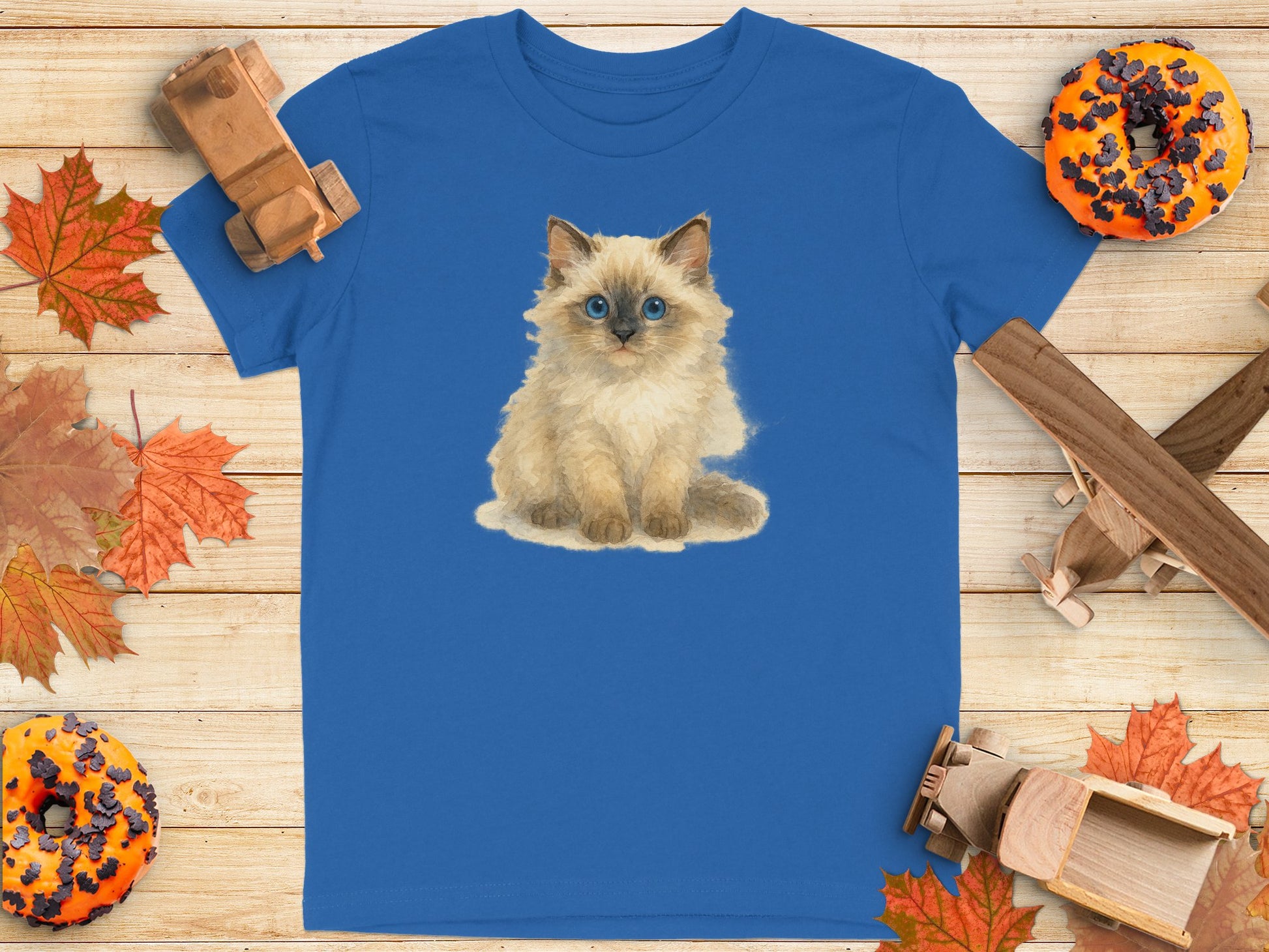 Adorable Blue Eyed Kitten Print on Blue T-shirt product type