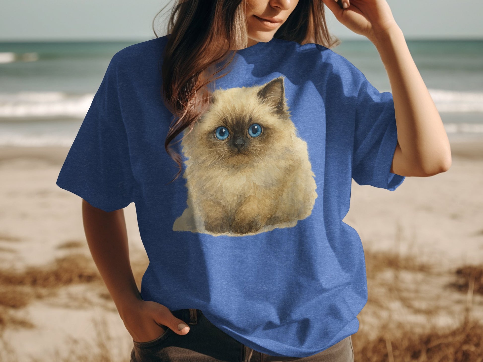 Cute Fluffy Kitten Illustration on Blue Graphic T-Shirt Product